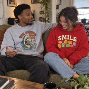 Friends wearing different Smile hoodies and crewnecks in an everyday moment.